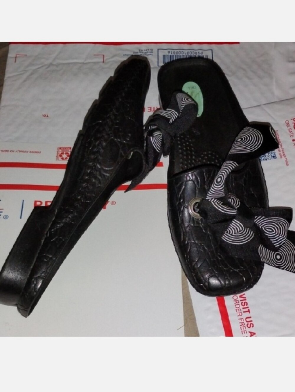 OKA b. Black Textured Slip-On Mules with Patterned Bow